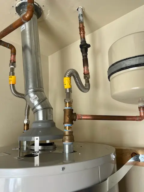 Water heater installation and plumbing repair in Burton